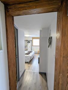 Posteľ alebo postele v izbe v ubytovaní Charmant appartement à Gérardmer