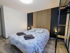 Posteľ alebo postele v izbe v ubytovaní Charmant appartement à Gérardmer