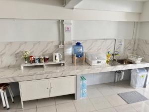 ครัวหรือมุมครัวของ Daisy house pattaya