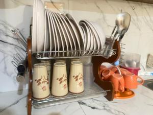 Kuchyň nebo kuchyňský kout v ubytování G-Home Stay Palawan + 10 fotografií