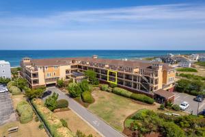 an aerial view of an apartment complex with the ocean at CSC3E Afternoon Delight in Kill Devil Hills