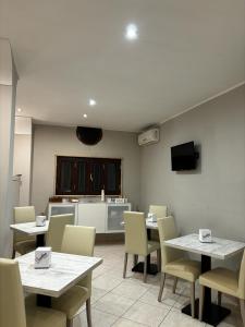 TV a/nebo společenská místnost v ubytování hotel glem