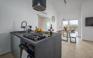 Køkken eller tekøkken på Villa Paradise