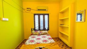 Ένα ή περισσότερα κρεβάτια σε δωμάτιο στο vkm homestay villa