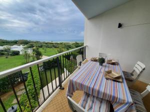 Balkón nebo terasa v ubytování DUNES 1D4 VUE MER WIFI CLIMATISATION PISCINE et son PK