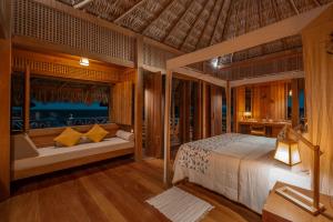 Cama ou camas em um quarto em Jaguaribe Lodge e Kite