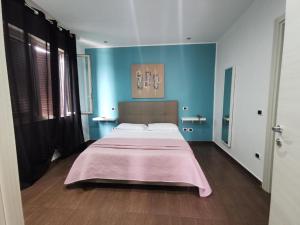 Postel nebo postele na pokoji v ubytování hotel glem