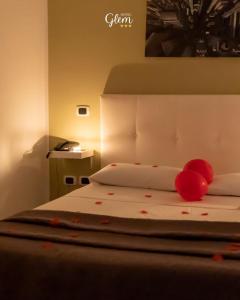 Postel nebo postele na pokoji v ubytování hotel glem