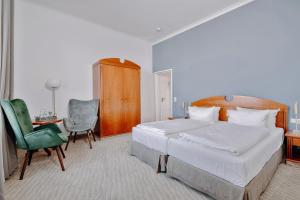 Postel nebo postele na pokoji v ubytování Seehotel Borkum