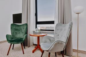 TV a/nebo společenská místnost v ubytování Seehotel Borkum