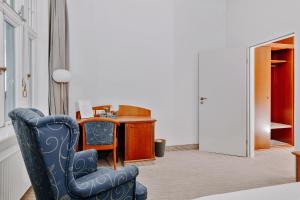 Postel nebo postele na pokoji v ubytování Seehotel Borkum