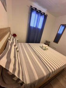 Posteľ alebo postele v izbe v ubytovaní Edificio Francisco Borras, apto Elisa ET - 80 PL