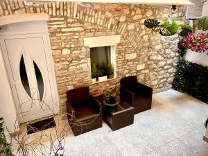 Posezení v ubytování Apartman in Centar Studio MOZZIRA Free breakfast