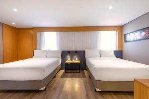Cama ou camas em um quarto em Holiday Inn Sao Paulo Parque Anhembi by IHG