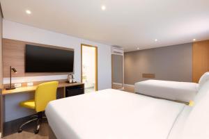 Uma TV ou centro de entretenimento em Holiday Inn Sao Paulo Parque Anhembi by IHG