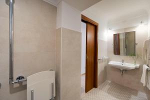 Koupelna v ubytování Hotel Villa Schuler