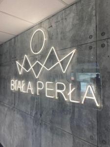 Πιστοποιητικό, βραβείο, πινακίδα ή έγγραφο που προβάλλεται στο Apartament 406 Prezydent Biała Perła