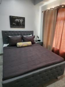 Кровать или кровати в номере Topview Apartment