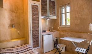 Kuchyň nebo kuchyňský kout v ubytování Stavlos Cottage + 23 fotografií