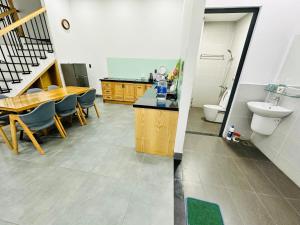 a bathroom with a sink and a toilet in a room at 24 Phan Huy Ích in Vung Tau +13 photos