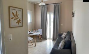 Posezení v ubytování ASPASIA APARTMENTS