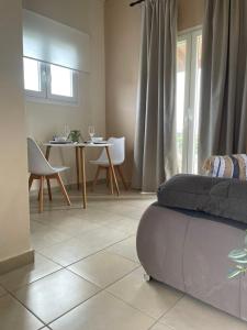 Posezení v ubytování ASPASIA APARTMENTS