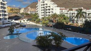 a large swimming pool on top of a building at Casa Serena in Los Cristianos