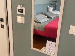 Łóżko lub łóżka w pokoju w obiekcie Bed & Breakfast con vista giardino e piscina