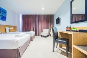 TV a/nebo společenská místnost v ubytování Vapa Hotel - SHA Extra Plus