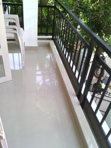 a pool on the balcony of a house at Nathans Holiday Home in Cochin