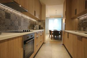 Kuchyň nebo kuchyňský kout v ubytování Sarajevo Daily Apartments
