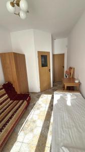 Postel nebo postele na pokoji v ubytování Sadyba