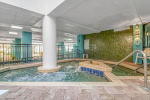 a hot tub in the lobby of a building at Modern & Updated Oceanview Studio! Sleeps 4! Landmark 523 in Myrtle Beach