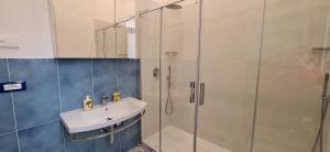 a bathroom with a sink and a shower at Mamma Giovanna in Maiori +31 photos