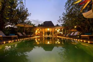 Bazén v ubytování Naya Ubud nebo v jeho okolí
