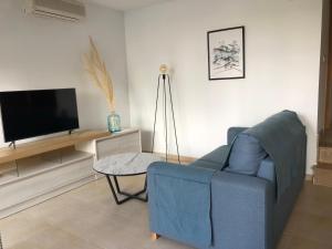 Televízia a/alebo spoločenská miestnosť v ubytovaní Residencial Dulcinea - Chalet