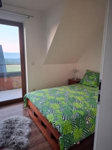 Postel nebo postele na pokoji v ubytování Za Przylaskiem