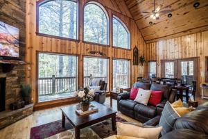 a living room with a couch and a table at Time Well Wasted in Stephens Gap