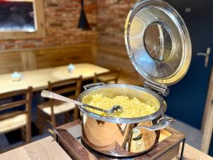 a scale sitting on top of a table with food at Pension U Studny in Harrachov