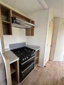 Køkken eller tekøkken på Lyon robin holiday park -SW33