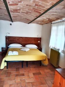 Postel nebo postele na pokoji v ubytování Casa Dona' Penne