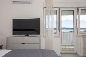 TV a/nebo společenská místnost v ubytování Studio Apartment Iva