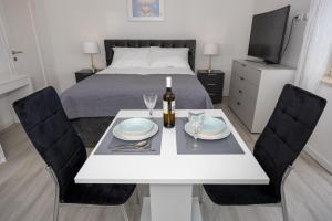 TV a/nebo společenská místnost v ubytování Studio Apartment Iva