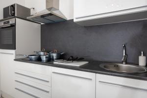 Kuchyň nebo kuchyňský kout v ubytování Studio Apartment Iva