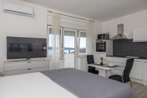 Kuchyň nebo kuchyňský kout v ubytování Studio Apartment Iva