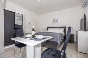 Postel nebo postele na pokoji v ubytování Studio Apartment Iva