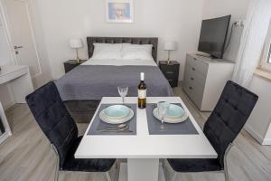 Postel nebo postele na pokoji v ubytování Studio Apartment Iva