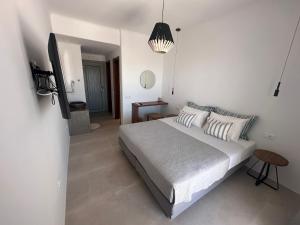 Postel nebo postele na pokoji v ubytování Ostria View Mykonos