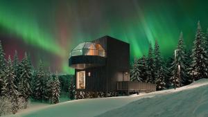 un rendu d'un bâtiment sous les aurores boréales dans l'établissement SkyView Igloo Resort, à Rovaniemi