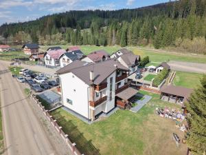 an aerial view of a large house at Pensiunea La Ancuța-n Bucovina in Voronet